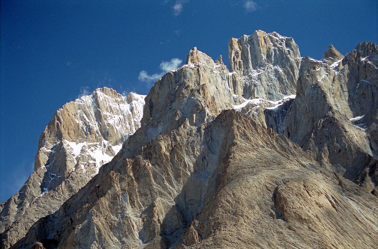 21 The Summit Of Great Trango Tower Is Directly Behind The Spires Of Trango Castle Just Before Khoburtse
